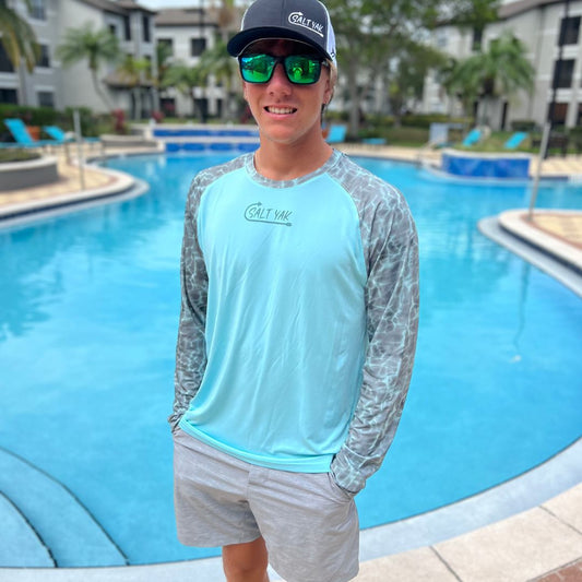 🌊🎣 Dive into Style and Protection: SPF 50 Fishing Shirt with Water Patterned Sleeves 🎣🌊